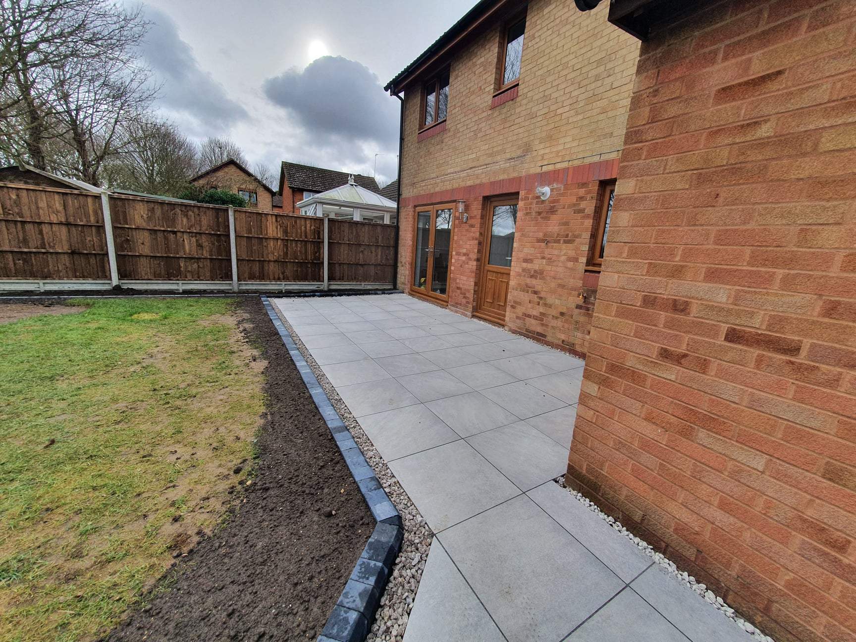 Porcelain Patio with grey border installed in Werrington