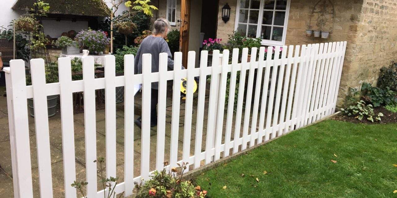 Smooth Wood Picket Fence in White installed in Peterborough