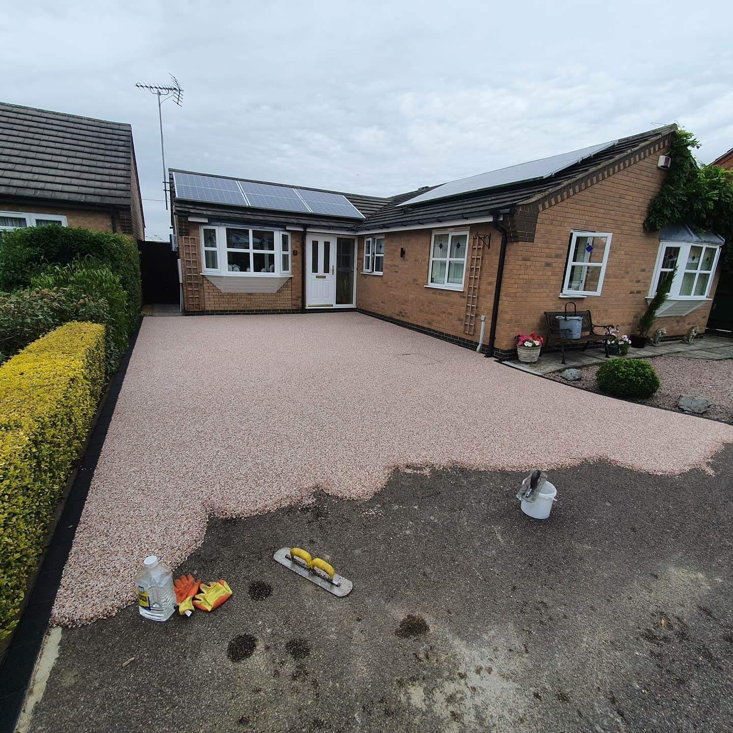 Resin Bound Driveway being completed in Newborough