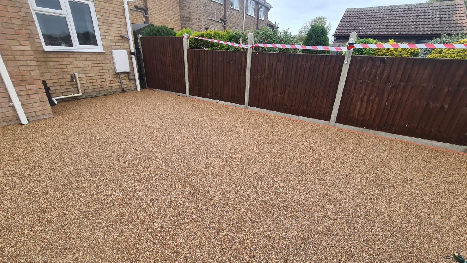Resin Bound Patio Finished in Sienna installed in Ramsey
